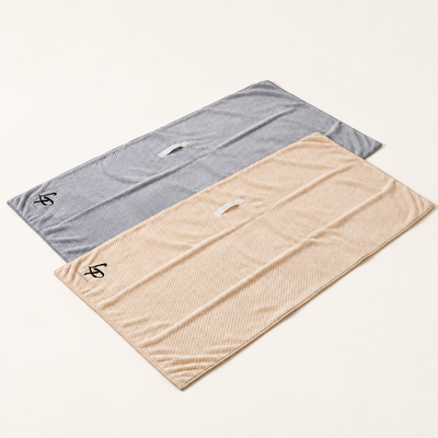 Deux serviettes microfibre Locks Passion sur fond crème