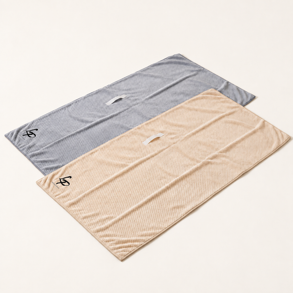 Deux serviettes microfibre Locks Passion sur fond crème